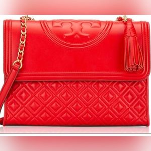Tory Burch quilted Lambskin Leather shoulder bag.